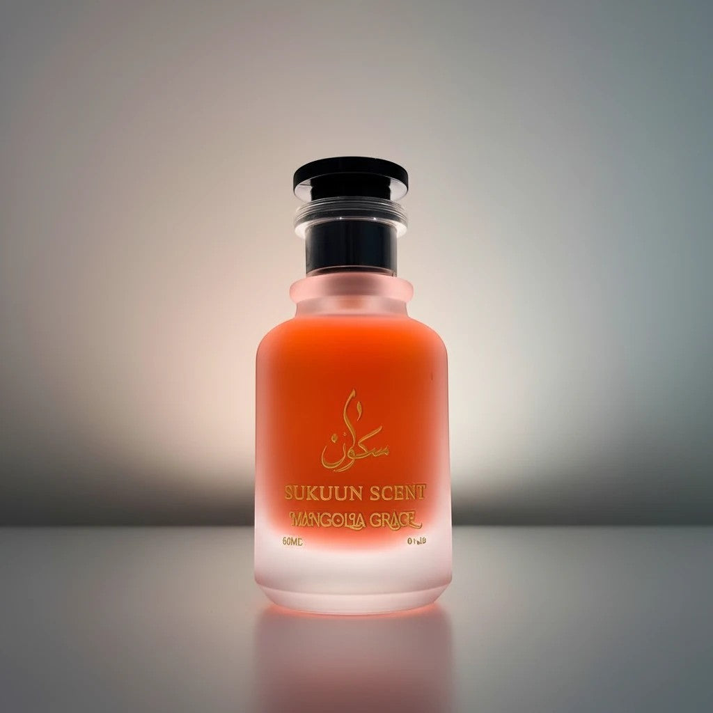 Sukuun Scent Magnolia Grace Eau de Parfum 50ML, a delicate floral fragrance in a frosted orange bottle.